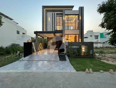 5 Marla Brand New Ultra Modern House Available in DHA 9 Town Best for investment & family living