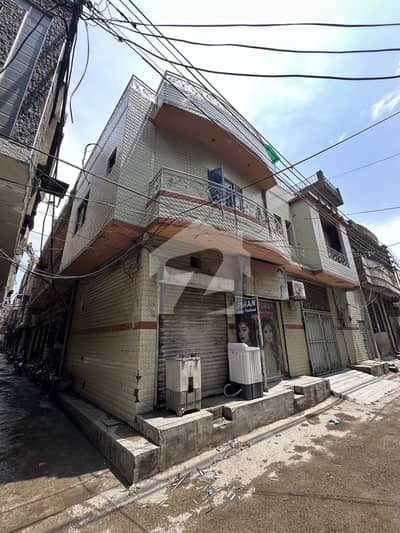 10 Marla Corner House For Sale With 2 Shops Double Storey Solid Construction