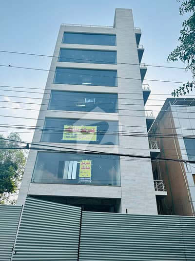 1 KANAL COMMERCIAL PAID 7 STORY BUILDING WITH BASEMENT PARKING