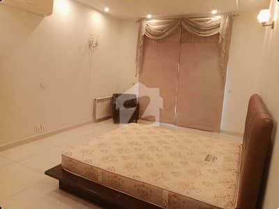 ELEGANT 27 MARLA FURNISHED 2 BED UPPER PORTION FOR RENT IN DHA PHASE 5 BLOCK B FEATURING A SEPARATE GATE