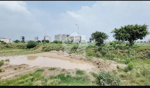 At Investor Rate 1 Kanal Residential Plot Good Loaction For Sale In DHA Phase 8 Lahore