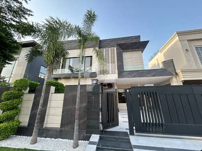 1 KANAL ELEGANT AND FULLY MAINTAINED DOUBLE HEIGHTED LOBBY BUNGALOW IS AVAILABLE IN THE BEST BLOCK OF DHA LAHORE.