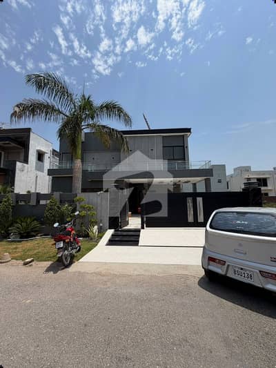1 KANAL ELEGANT & FULLY MAINTAINED SUPER HOT LOCATED BUNGALOW NEAR TO DOLMEN MALL IS AVAILABLE IN DHA, LAHORE | 7 ACs INSTALLED