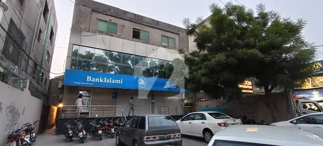 20 MARLA COMMERCIAL BUILDING FOR SALE BASEMENT WITH 3 STORY LDA LIFE TIME COMMERCIAL PAID MAIN COLLEGE ROAD LAHORE