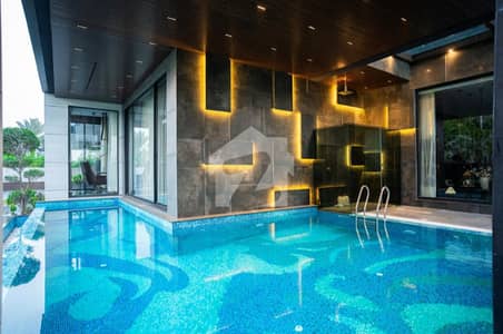 2 Kanal Brand New Luxury Ultra-Modern Design Most Beautifu Facing Park Solar Installed Fully Furnished Full Basement Swimming Pool Home Theater Lift Bungalow For Sale At Prime Location Of Dha Lahore Near To Park Masjid & DHA Raya Fairways Commercial
