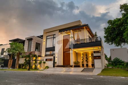 One Kanal Brand New Luxury Ultra-Modern Design Most Beautiful Fully Furnished Bungalow 2 Servant Quarter In Basement For Sale At Prime Location Of DHA Lahore Near To Park Masjid & Commercial Market.