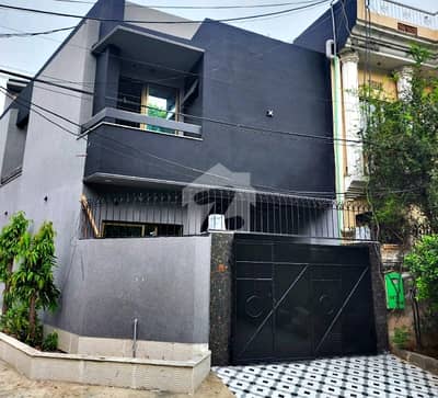 5Marla Double Story Brand New House For Sale Johar Town Phase 2 Near Expo Center And Emporium Mall Near Canal Road Tiles Flooring Behtarin Woodwork Corner Facing Park VIP Location