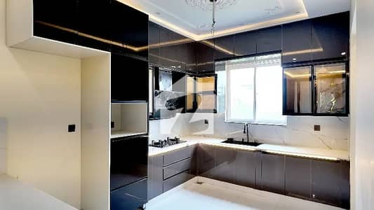 10 Marla Tiled Elevation Solid Construction House Available For Sale In TaRiQ Garden Society Near Valancia Town Lahore