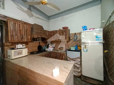 5 Marla Triple Storey Semi Commercial Facing Park House with 2 Shops on 40 Feet Road