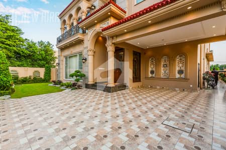 Exquisite Spanish Residence In DHA Phase 6 Block G, 5 Beds, 3 Kitchens, Powder Room, Basement With 3 Servant Quarters, Steps From Park, Mosque & Commercial, Easy Deal With Motivated Seller!