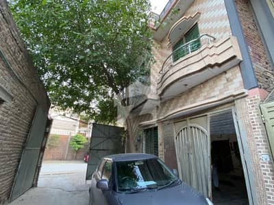 4.5 MARLA CORNER HOUSE AND 3 SHOPS UNDER THE HOUSE FOR SALE