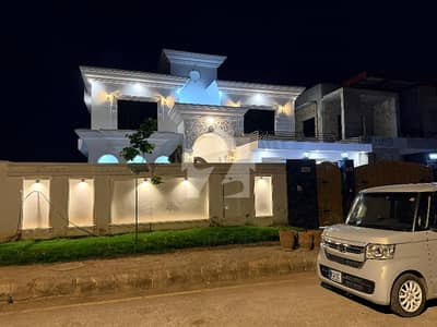 DHA Peshawar 1 kanal Luxury 8-Bedroom Double-Story House with Basement & Lawn is available for sale DHA Peshawar 1 kanal Luxury 8-Bedroom Double-Story House with Basement & Lawn is available for sale