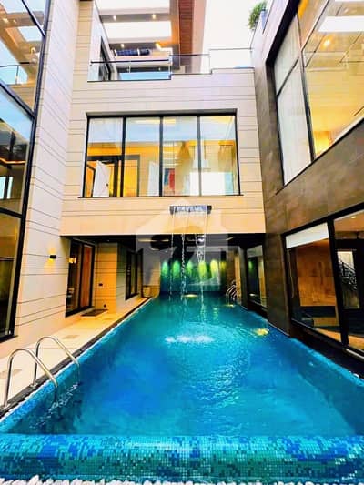 1 KANAL ULTRA LUXURY TOP-NOTCH BUNGALOW WITH SWIMMING POOL & FULL BASEMENT | DHA PHASE 6 | 70 FT ROAD | NEAR DOLMEN MALL | 100% ORIGINAL DEAL