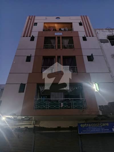 100 Yards Building for Sale 3 Shops & 4 Apartments | Phase 7 Jami Commercial 100 Yards Building for Sale 3 Shops & 4 Apartments | Phase 7 Jami Commercial