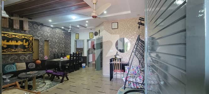5 marla allmost good condition house 4 bad tile flooring best for famlies resident