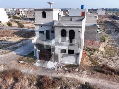 Well-constructed Grey Structure House Available For sale In New Lahore City