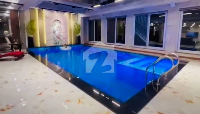 4 Kanal House With Swimming Front Back Lawn. 4 Kanal House With Swimming Front Back Lawn.