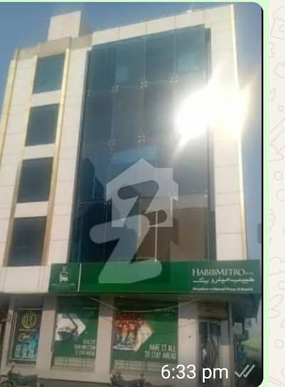 A Stunning Corner Building Is Up For Grabs In DHA Phase 6 Karachi