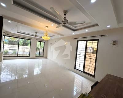 1 Kanal Slightly Used Modern Design House For Rent In DHA Phase 1 Lahore.