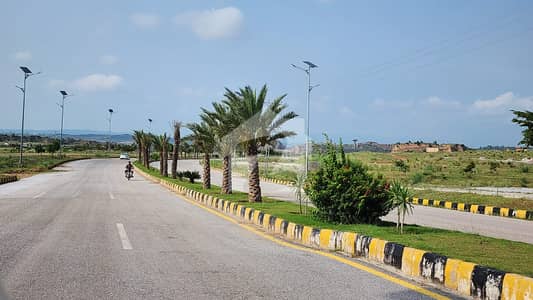 BLUEBELL BLOUVARD Front open Park facing Prime and Heighted Location COMMERCIAL Plot Available for Sale in DHA Phase 7 VALLEY ISLAMABAD