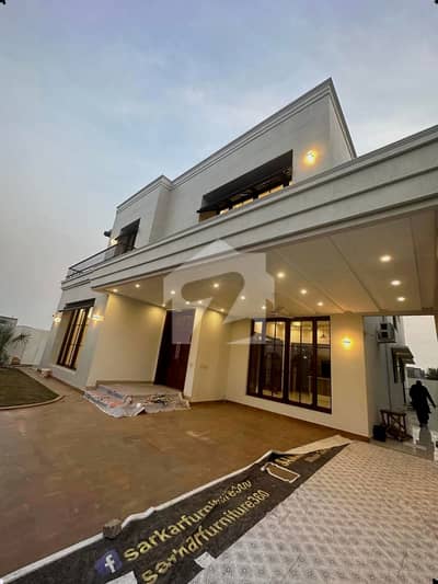 INVEST IN DHA PHASE 7 BLOCK P WITH THIS REMARKABLE 1 KANAL 5 BEDROOM RESIDENTIAL HOUSE FOR SALE