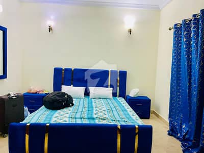 F-11 Markaz 2 Bedroom Attached Bath Tv Lounge Kitchen Car Parking Fully Furnished Apartment Available For Rent
