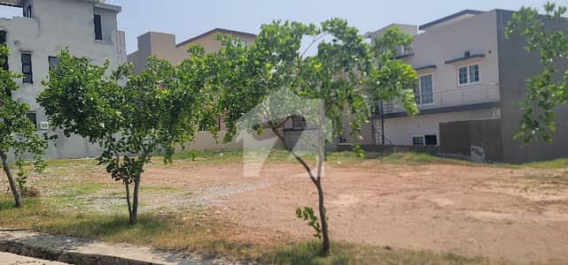 11 Marla Level and Sunfacing plot with big front for sale. Dem 105 negotiable