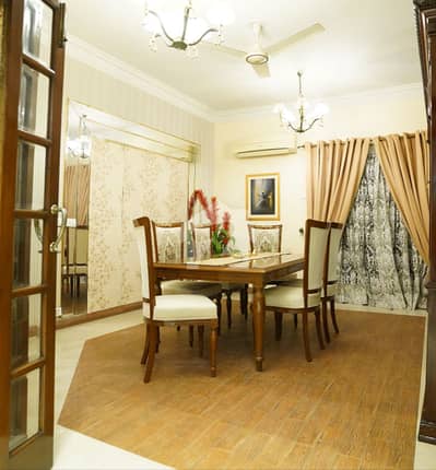 Defence 2 Kanal Bungalow With 1 Kanal Lawn BN Basement Full Furnished Designer House