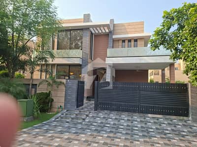 SYED BROTHERS PROUDLY OFFERS: 1-Kanal Elegant And Fully Maintained Modern Design Bungalow Near Raya Is Available In The Best Block Of DHA Lahore.