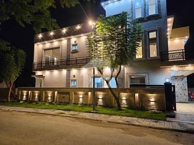 10 Marla Corner Designer House with extra land Sec F DHA 2 For Sale