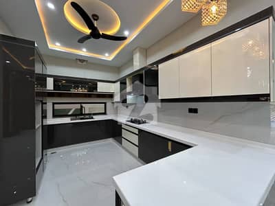 10Marla Triple brand new House For Rent 7bed With Washroom Drawing Dining Tv Lounge 2 Kichen Servant Room Parking Gas Electric