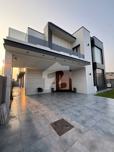 DHA Phase 6 Prime Location One Kanal Used House For Sale | 5 Beds with Attached Baths | 2 TV Lounges, Drawing & Dining | 2 Kitchens + Dirty Kitchen | 4-Car Parking | 10-KVA Solar with Green Meter & Huawei Inverter | Demand 10.75 Crore Negotiable