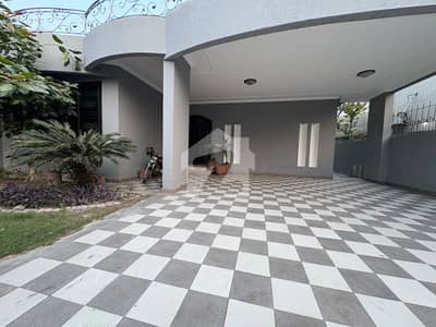 AC Installed 1 Kanal Slightly Used Modern Design House For Rent In DHA Phase 4 Lahore.