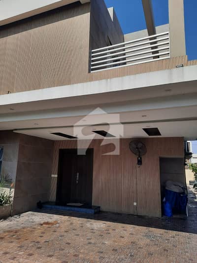 1 KANAL ELEGANT AND FULLY MAINTAINED CORNER MODERN BUNGALOW WITH FULL BASEMENT IS AVAILABLE IN THE BEST BLOCK OF DHA LAHORE.