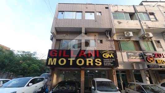 Prime Commercial Property for Sale G-8 Markaz | 2 Shops + 2 Apartments | Roof Rights | PKR 5 Lac Monthly Rental