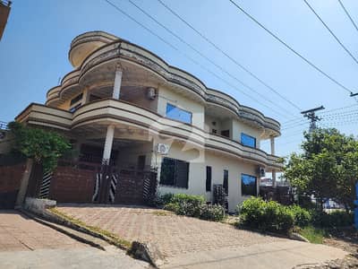 Elite 12-Marla Triple-Unit Double Road Corner House for Sale Block I-8/4, Islamabad!