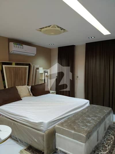 750 Sq. Ft. Furnished One-Bed Apartment Facing Eiffel Tower For Sale in SQ 99 Mall, Nishtar Block, Sector E, Bahria Town Lahore