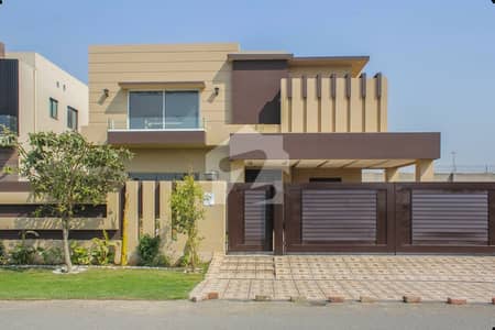 GRAND 1 KANAL PREMIUM RESIDENTIAL HOUSE FOR SALE IN THE HIGHLY COVETED AREA OF DHA PHASE 7 BLOCK R FEATURING 5 BEDROOMS