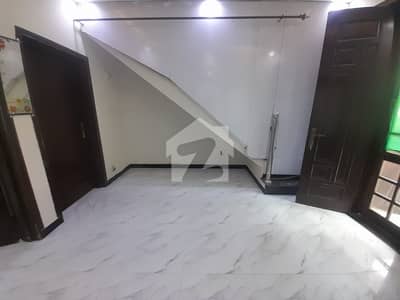 Beautiful 4 Marla House for Sale in G-14/4 Islamabad Equipped with Solar System, Premium Tiles Flooring & All Basic Amenities in a Prime Residential Location