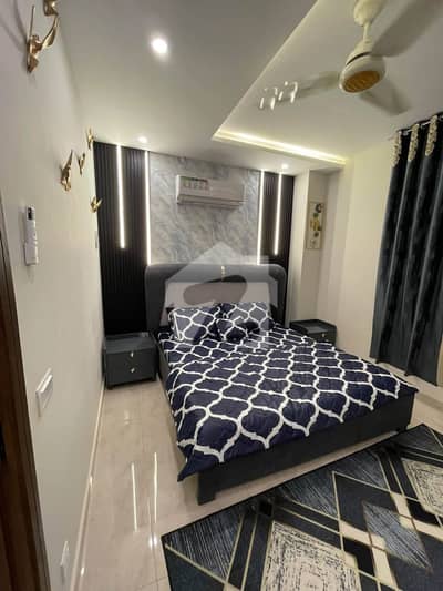 ONE BED LUXURIOUS FURNISHED APARTMENT FOR SALE AT PRIME LOCATION OF BAHRIA TOWN LAHORE