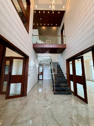 A Triple-Height Welcome | Semi-Furnished House with Premium Finishes | DHA Phase 7