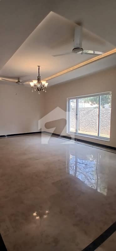 A beautiful house for rent in f10 ideal location All tile flooring near to market close to double road Big parking front beautiful lawn