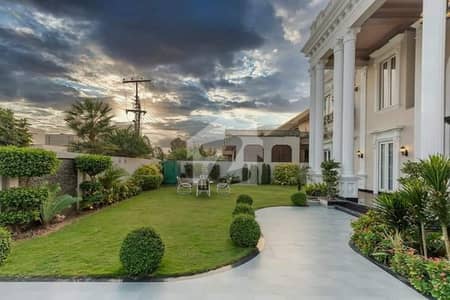 2 KANAL SLIGHTLY USED BUNGALOW IS AVAILABLE IN THE M BLOCK OF DHA PHASE 1 NEAR NATIONAL HOSPITAL LAHORE.