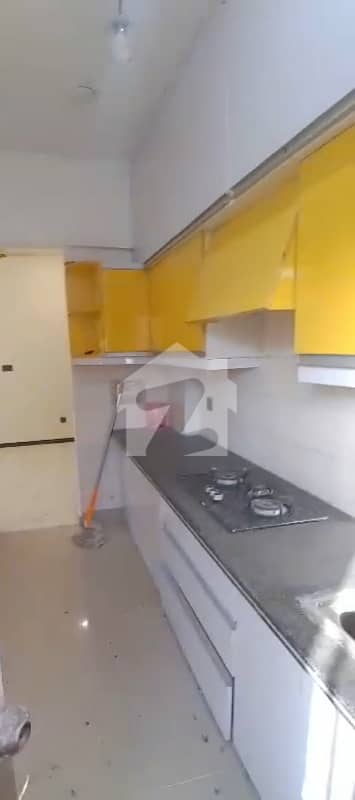 FLAT FOR RENT 2 BEDS 3 BATHS D. D 4TH FLOOR PHASE 6 DHA KARACHI
