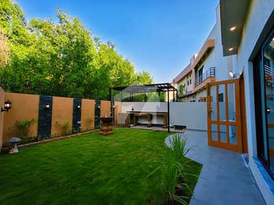 12 Mrla Brand New Designer House With Beautiful Lawn For Sale