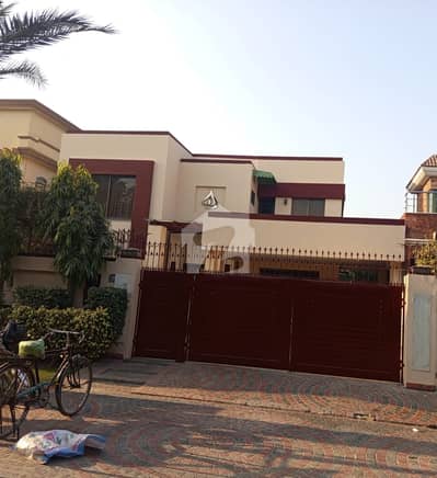 SYED BROTHERS PROUDLY OFFERS: 1-Kanal Elegant And Fully Maintained Bungalow Is Available In The Best Block Of DHA Lahore.