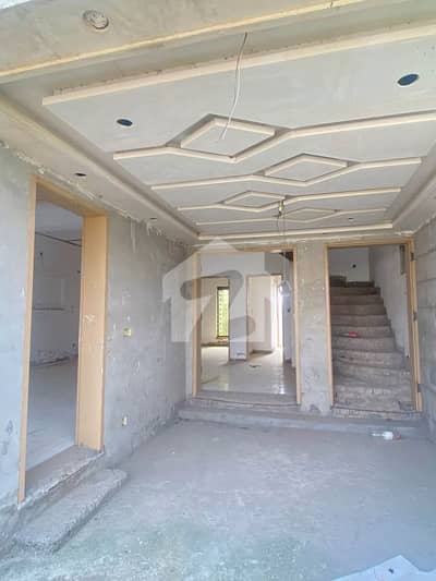 Grey Structure of 5 Marla House Available For Sale In Tauheed Block Sector F Bahria Town Lahore