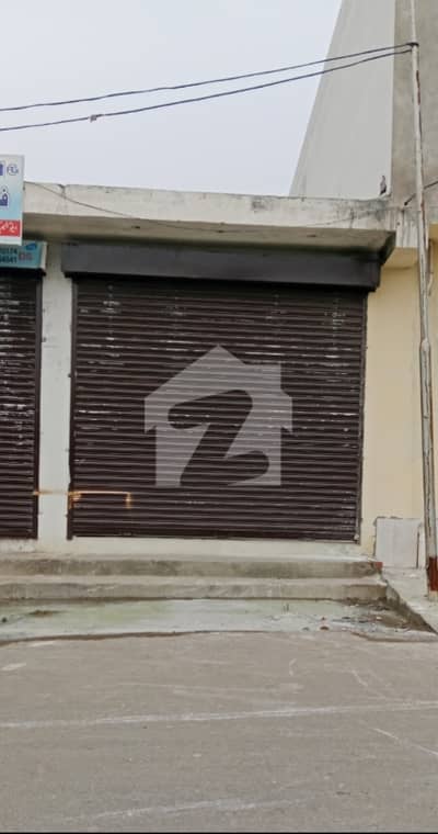 Commercial Shop Good Location Near Eden Boulevard Located Abdullah Garden Society LHR.