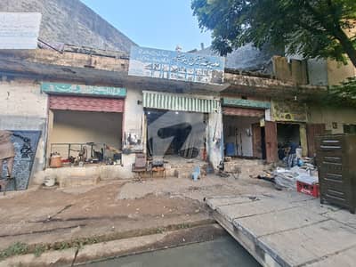4 Marla cmrtiol 4 shop for sale main canal road harbanspura location
