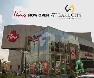 Downtown building 8 Marla commercial  Brim Burger opposite 6 floor Hot location rental income 22 lac Best investment opportunities